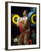 Male Lifting Heavy Weights in Competition at the Olympics-John Dominis-Framed Premium Photographic Print