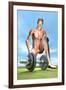 Male Musculature Looking at a Dumbbell on the Grass-null-Framed Art Print