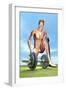 Male Musculature Looking at a Dumbbell on the Grass-null-Framed Art Print