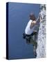 Male Rock Climber Reaching for a Grip-null-Stretched Canvas