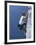 Male Rock Climber Reaching for a Grip-null-Framed Photographic Print