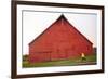 Male Runner Runs Along A Gravel Trail In Front Of Bright Red Barn In UI Arboretum In Moscow, Idaho-Ben Herndon-Framed Photographic Print