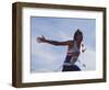 Male Runner Victorious at the Finish Line in a Track Race-null-Framed Photographic Print