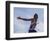 Male Runner Victorious at the Finish Line in a Track Race-null-Framed Photographic Print