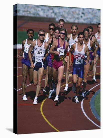 Male Runners Competing in a Track Race-null-Stretched Canvas