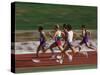 Male Runners Competing in a Track Race-null-Stretched Canvas