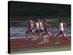 Male Runners Competing in a Track Race-null-Stretched Canvas