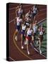 Male Runners Competing in a Track Race-null-Stretched Canvas