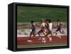 Male Runners Competing in a Track Race-null-Framed Stretched Canvas