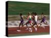 Male Runners Competing in a Track Race-null-Stretched Canvas