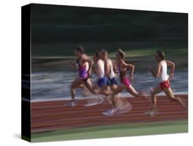 Male Runners Competing in a Track Race-null-Stretched Canvas