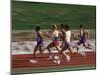 Male Runners Competing in a Track Race-null-Mounted Photographic Print