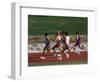 Male Runners Competing in a Track Race-null-Framed Photographic Print