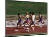 Male Runners Competing in a Track Race-null-Mounted Photographic Print