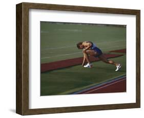 Male Runners Stetching before Competing in a Track Race-null-Framed Photographic Print