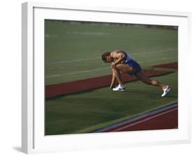 Male Runners Stetching before Competing in a Track Race-null-Framed Photographic Print