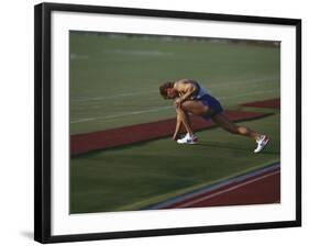 Male Runners Stetching before Competing in a Track Race-null-Framed Photographic Print