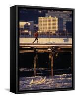 Male Running in Snow Through the City, New York, New York, USA-null-Framed Stretched Canvas