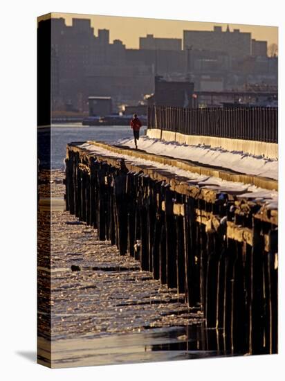 Male Running in Snow Through the City, New York, New York, USA-null-Stretched Canvas