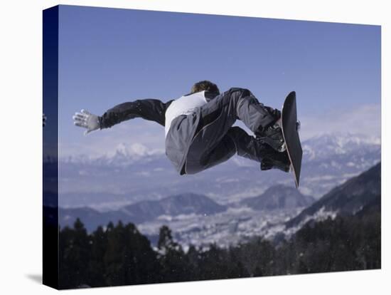 Male Snowboarder Flying over the Vert-null-Stretched Canvas