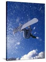 Male Snowboarder Flying Throught the Air-null-Stretched Canvas