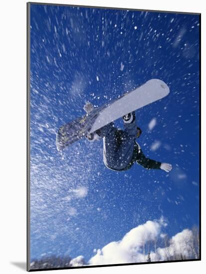 Male Snowboarder Flying Throught the Air-null-Mounted Photographic Print