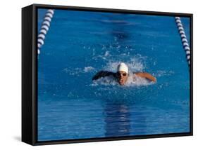 Male Swimmer Competing in a Butterfly Race-null-Framed Stretched Canvas