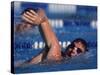 Male Swimmer Competing in a Freestyle Race-null-Stretched Canvas