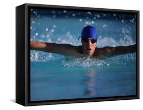 Male Swimmer Competing in Abutterfly Race-null-Framed Stretched Canvas