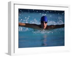 Male Swimmer Competing in Abutterfly Race-null-Framed Photographic Print