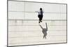 Male Tracer Free Runner Jumping Forward from High Rooftop over Cement Building Background, Young Tr-GaudiLab-Mounted Photographic Print