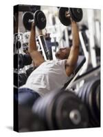 Male Working Out with Weights in a Health Club, Rutland, Vermont, USA-Chris Trotman-Stretched Canvas