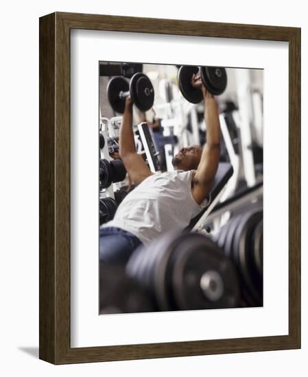 Male Working Out with Weights in a Health Club, Rutland, Vermont, USA-Chris Trotman-Framed Photographic Print