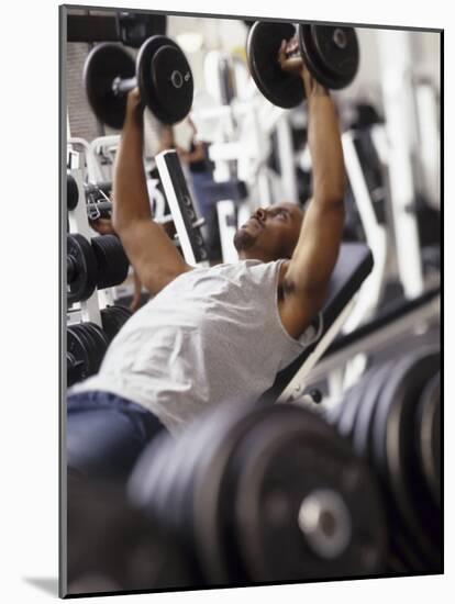 Male Working Out with Weights in a Health Club, Rutland, Vermont, USA-Chris Trotman-Mounted Photographic Print