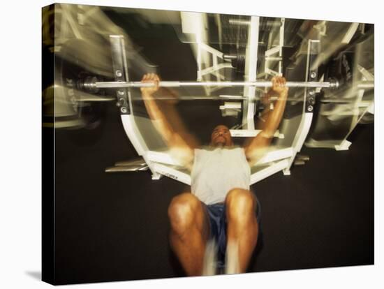 Male Working Out with Wieghts in a Health Club, Rutland, Vermont, USA-Paul Sutton-Stretched Canvas