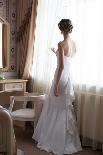 Beautiful Bride in White Wedding Dress Standing in Her Bedroom and Looking in Window-Malyugin-Stretched Canvas