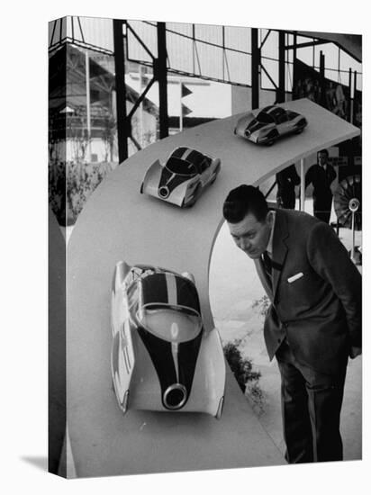 Man Admiring Fiat Automobile Exhibit at the Milan Fair-Ralph Crane-Stretched Canvas