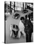 Man Admiring Fiat Automobile Exhibit at the Milan Fair-Ralph Crane-Stretched Canvas