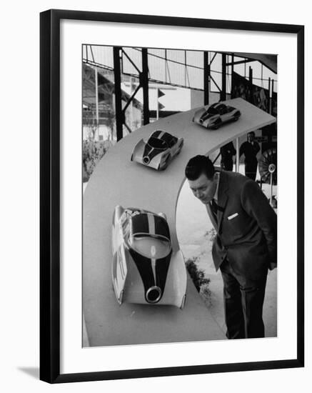 Man Admiring Fiat Automobile Exhibit at the Milan Fair-Ralph Crane-Framed Photographic Print