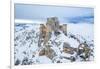 Man admiring the snowy medieval castle of Rocca Calascio after heavy snowfall, Rocca Calascio-Paolo Graziosi-Framed Photographic Print