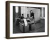 Man and a Women Working Together with a Pegasus Computer-null-Framed Photographic Print