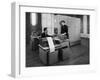 Man and a Women Working Together with a Pegasus Computer-null-Framed Photographic Print