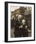 Man and Boy Holding a Dachshund-null-Framed Photographic Print