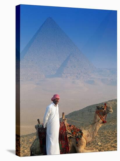 Man and Camel at Pyramids, Cairo, Egypt-Peter Adams-Stretched Canvas