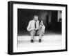 Man and Dog Sitting on the Steps Reading the Newspaper-null-Framed Photo