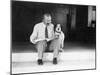 Man and Dog Sitting on the Steps Reading the Newspaper-null-Mounted Photo