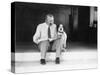 Man and Dog Sitting on the Steps Reading the Newspaper-null-Stretched Canvas