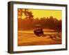 Man and Golf Cart Silhouetted at Sunset-Bill Bachmann-Framed Premium Photographic Print