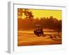 Man and Golf Cart Silhouetted at Sunset-Bill Bachmann-Framed Premium Photographic Print