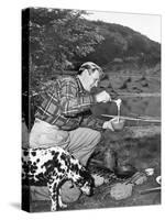 Man and His Dog Camping and Preparing Food-null-Stretched Canvas